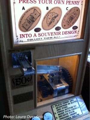 Pinched souvenir penny machine